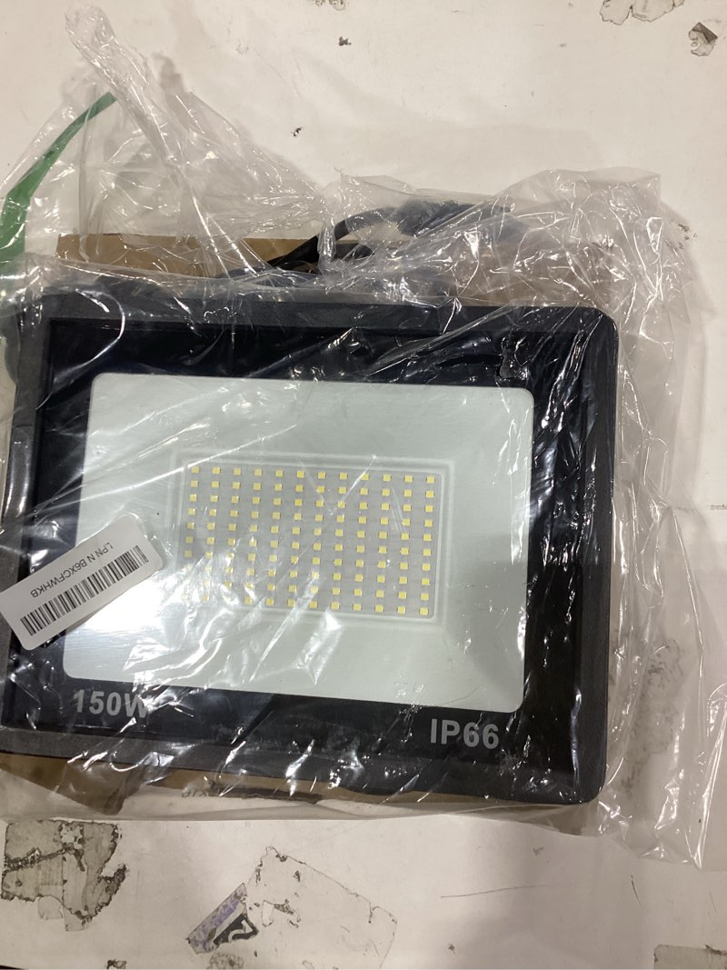 Condition photo showing Good Condition for 150w black plug-in outdoor 3836 lumen integrated led flood light with 9. 8ft cord, waterproof dusk to dawn light 