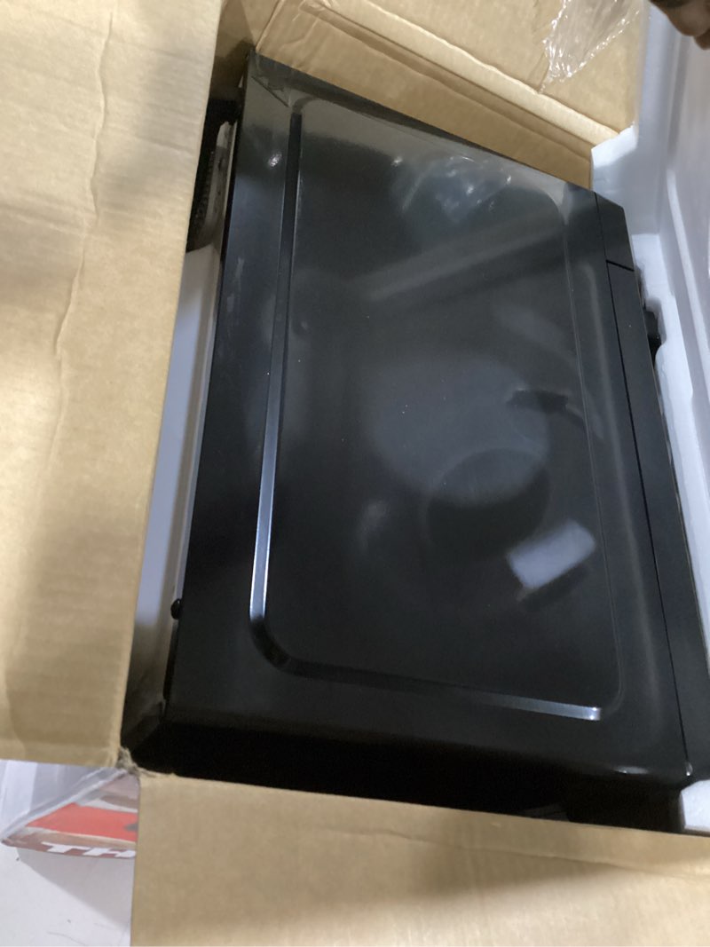 Condition photo showing Good Condition for Chefman Countertop Microwave Oven 0.7 Cu. Ft., 700 Watts with 10 Power Levels, 6 Cooking Presets with One-Touch Express Cook, Eco Mode, Child Safety Lock, & Mute Button - Black