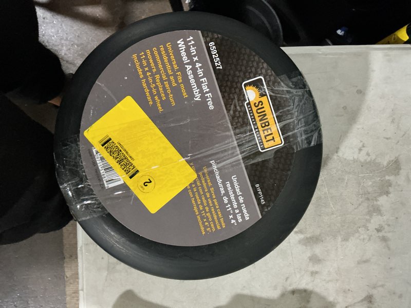 Condition photo showing As Is for sunbelt 11-in x 4-in-5-in smooth-front wheel tire
