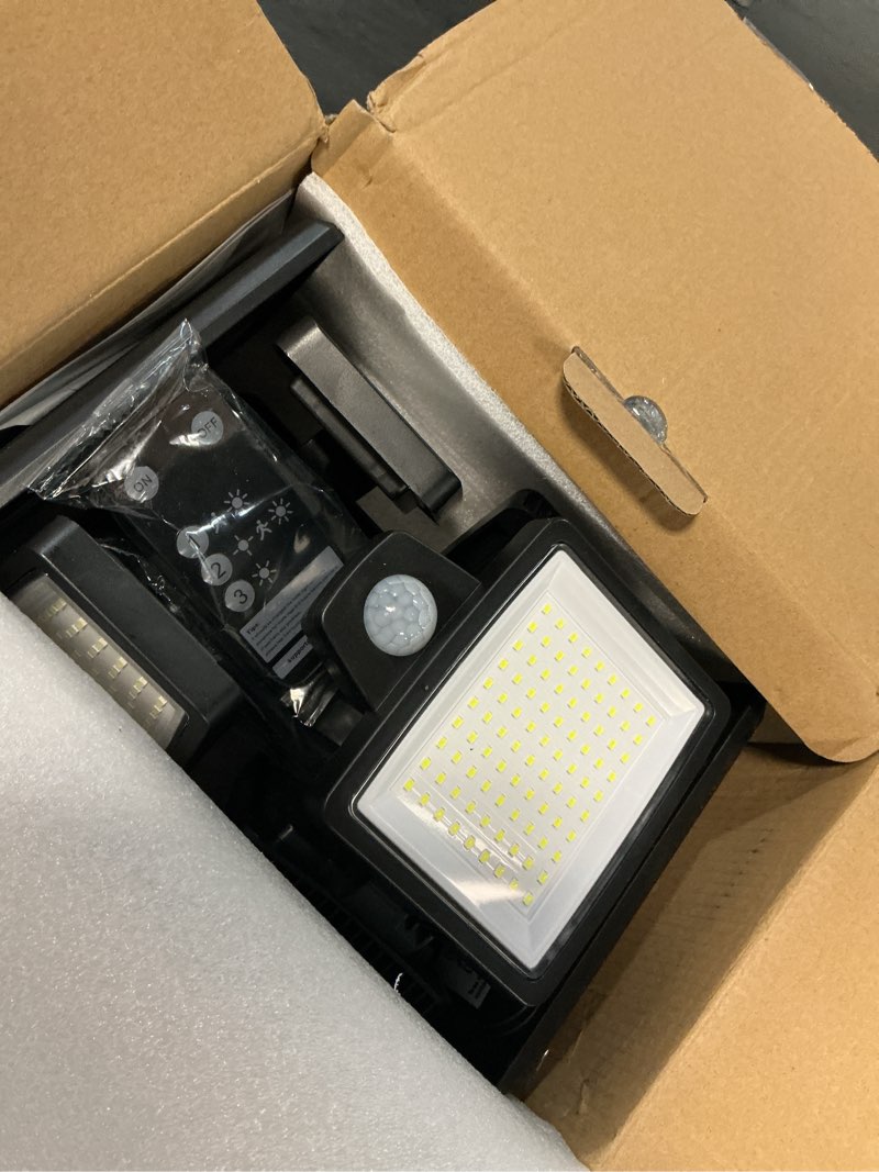 Condition photo showing Good Condition for tuffenough solar outdoor lights 2500lm 210 led security lights with remote control,3 heads motion sensor lights, ip65 waterproof,270° wide angle flood wall lights with 3 modes(2 packs)