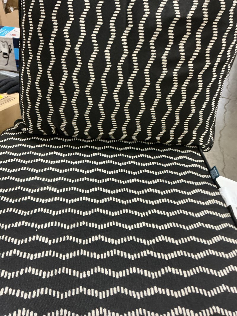Condition photo showing As Is for origin 21 20-in x 20-in black helix jacquard high back patio chair cushion