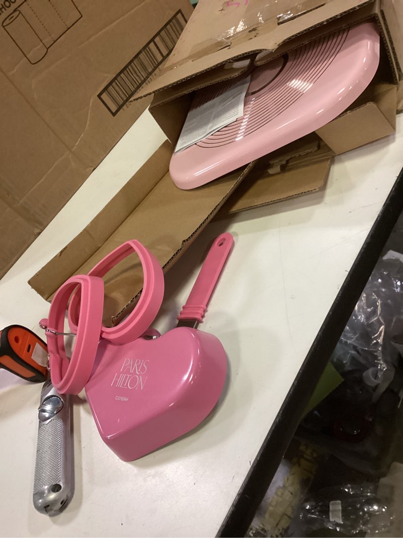 Condition photo showing Good Condition for Paris Hilton Breakfast Ceramic Nonstick Cookware Set, Includes Square Griddle, Mini Heart Shaped Fry Pan and Two Silicone Heart Shaped Egg Rings, 4-Piece Set, Pink