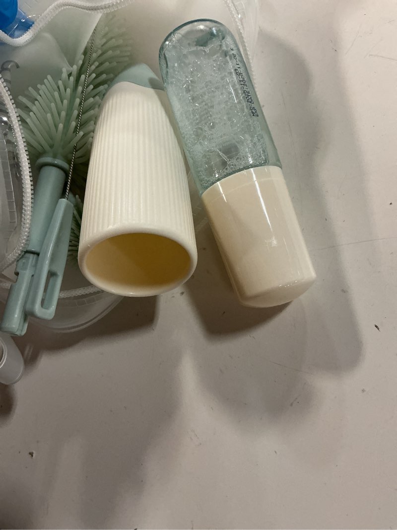 Condition photo showing Good Condition for Momcozy Bottle Brush Kit, Innovative Push-Press Design for Better Cleaning - Baby Bottle Cleaner Brush for Baby Bottle, Breast Pumps, Nipples, and More - Can Generate Foam for Better Cleaning, Green Press Bubble Style Green