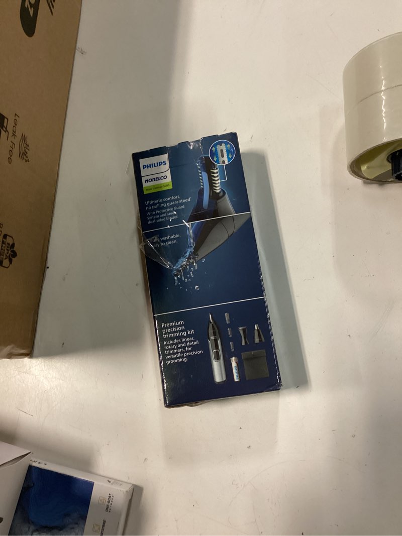 Condition photo showing New/Like New for norelco philips nose trimmer 5000 for nose, ears, eyebrows trimming kit, nt5600/62 black, silver 7.9 inch (pack of 1)