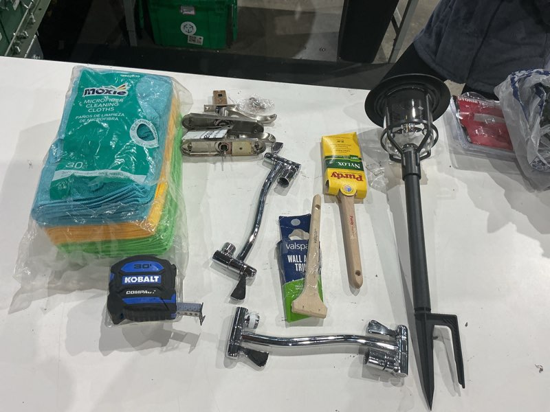 Condition photo showing As Is for assorted home improvement lot (small tools, screw, home accessories, etc.)