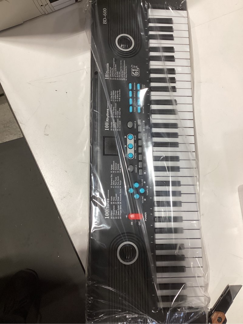 Condition photo showing Good Condition for 61 Key Keyboard Piano with Built-in Speaker and Microphone, Portable Electronic Digital Piano for Beginners, Perfect Musical Starter Instrument, Ideal Gift for Aspiring Musicians Black