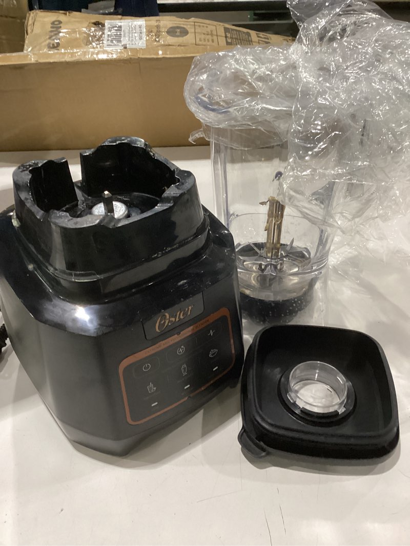 Condition photo showing As Is for used not tested oster extreme mix blender, 1500-watt high-speed countertop blender with 64oz jar & auto programs, perfect for smoothies, milkshakes, salsa 1500 watts tritan jar
