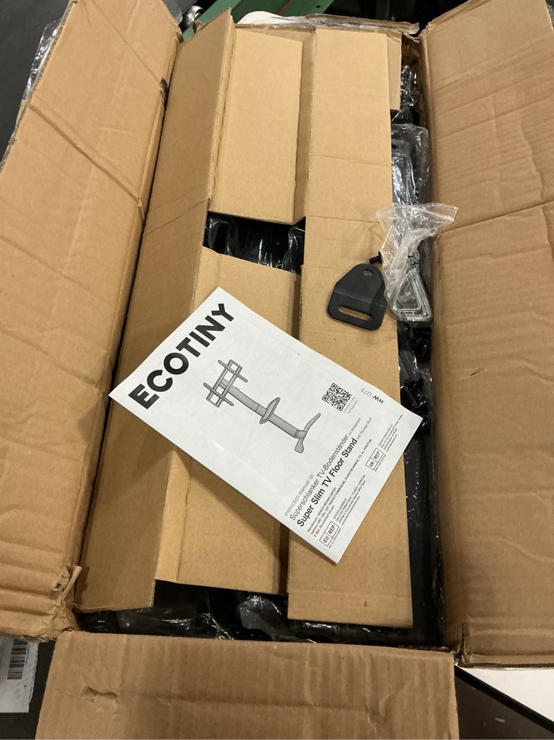 Condition photo showing As Is for Ultra Slim Floor TV Stand for 37–86 Inch TVs, Modern Curved Base with Shelf, Adjustable Height & Tilt, Space-Saving Design with Cable Management, Fits VESA 600x400mm, Black