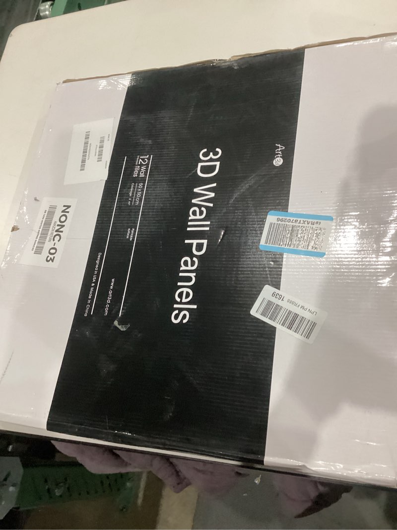 Condition photo showing New/Like New for Art3d 19.7" x 19.7" (Pack of 12) Wall Panel City, Black 19.7" x 19.7" Black 12