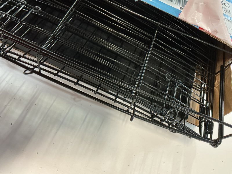 Condition photo showing As Is for vibrant life single-door folding dog crate with divider, 24"