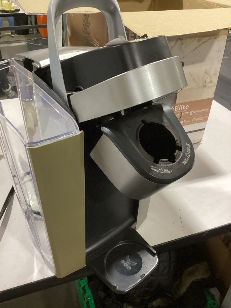 Condition photo showing As Is for (Maybe missing hardware)Keurig K-Elite Single Serve K-Cup Pod Coffee Maker, with Strength and Temperature Control, Iced Coffee Capability, 8 to 12oz Brew Size, Programmable, Brushed Silver