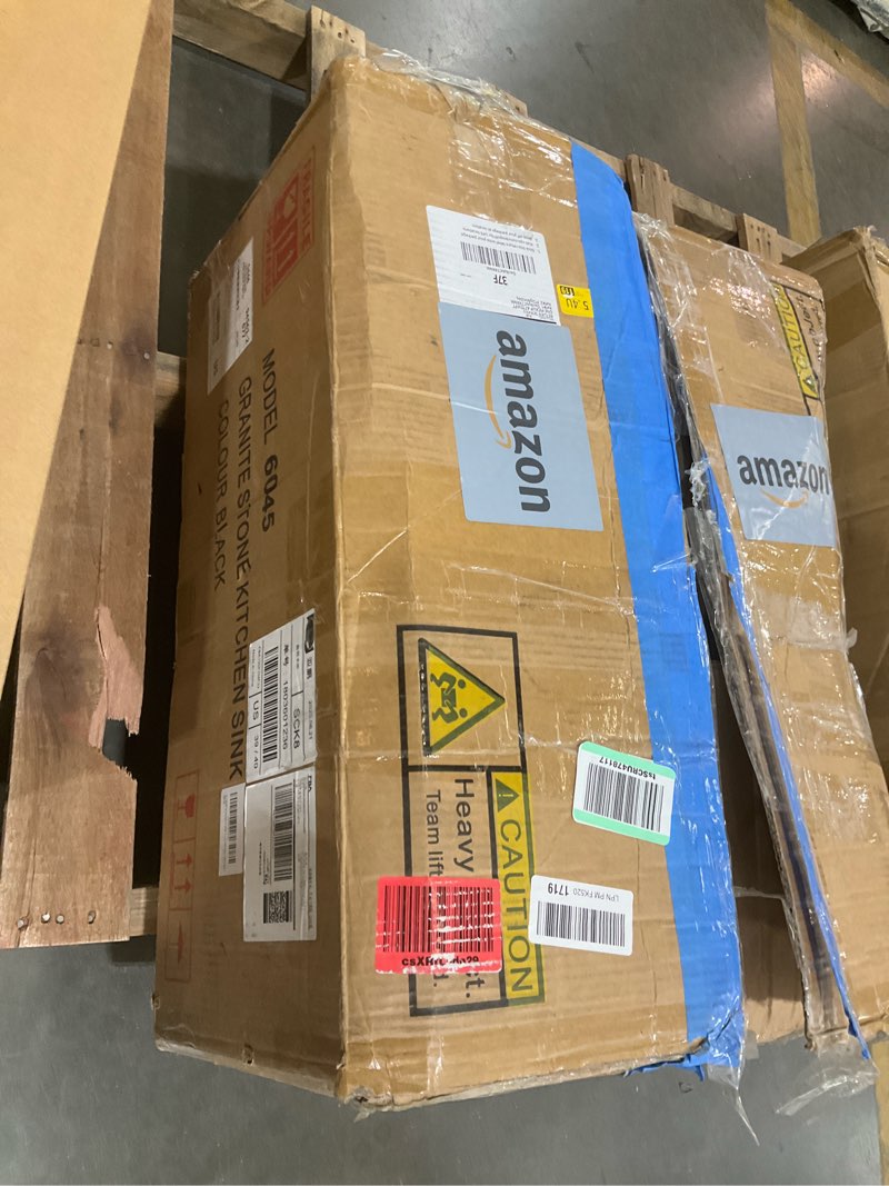 Condition photo showing As Is for stone kitchen sink