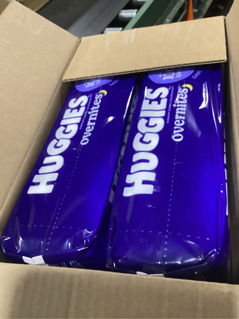 Condition photo showing New/Like New for huggies overnites diapers econ+ pack - size 7 - 68ct