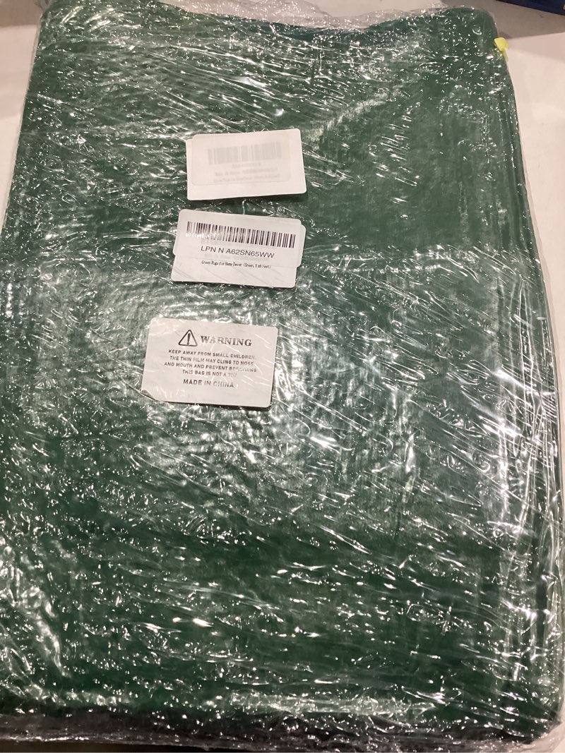 Condition photo showing Good Condition for Green Rugs for Living Room 5x8: Dark Green Shag for Bedroom-Large Fuzzy Plush Soft Carpets, Shaggy Area Rugs for Living Room, Carpet for Kids Boys Girls Dorm Home Decor Aesthetic Green Fluffy 5' x 8' (Rectangular)
