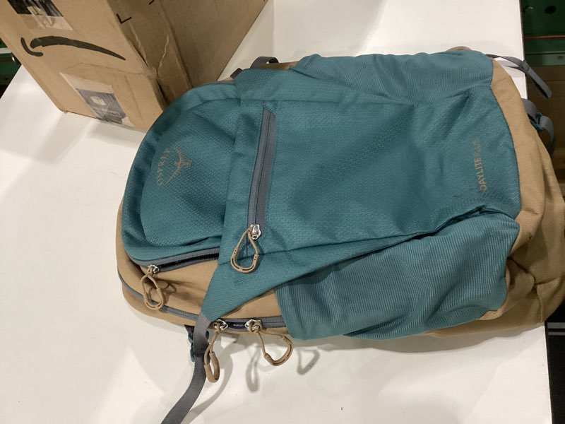 Condition photo showing Good Condition for osprey daylite plus commuter backpack - lightweight, everyday pack with laptop sleeve and water bottle pockets - ideal for campus, work, and travel with versatile storage, cascade blue/latte brown