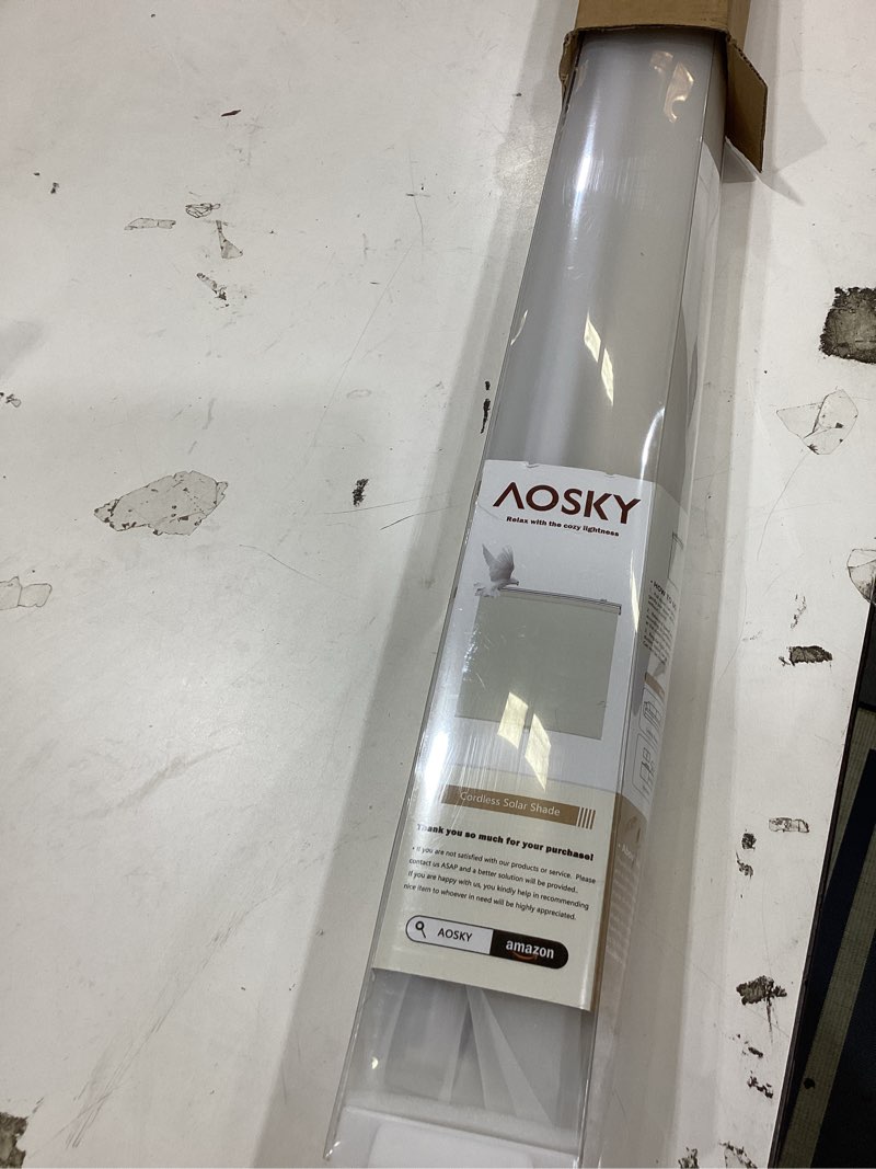Condition photo showing Good Condition for aosky cordless roller shades for windows light filtering shades with 5% openness solar screen semi sheer roller blinds uv protection for office and home. easy to install 48" w x 72" h (beige) 48"w x 72"h beige