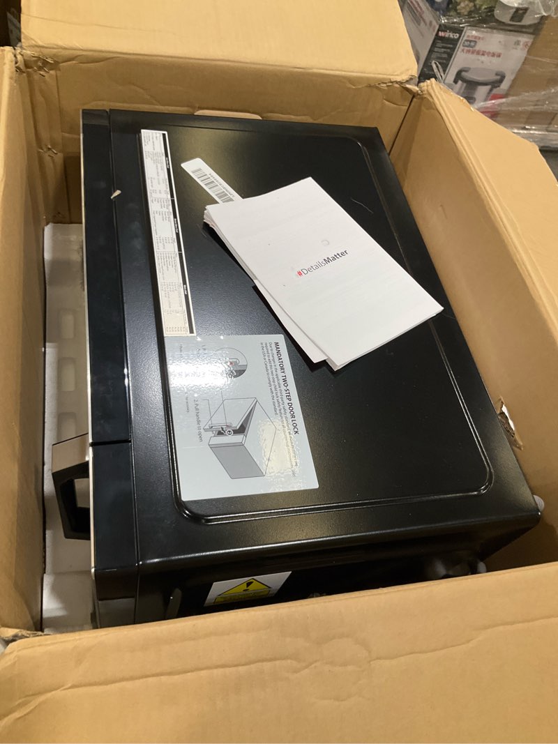 Condition photo showing As Is for toshiba em131a5c-ss countertop microwave ovens 1.2 cu ft with 12.4" removable turntable smart humidity sensor, 12 auto menus mute function eco mode easy clean interior, 1000w, silver 1.20 cu.ft