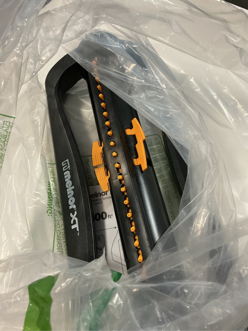 Condition photo showing As Is for melnor 65167amz xt turbo oscillating sprinkler, 4,500 sq. ft., quick connect bundle, 3-way adjustable, black, yellow standard 3-way adjustable
