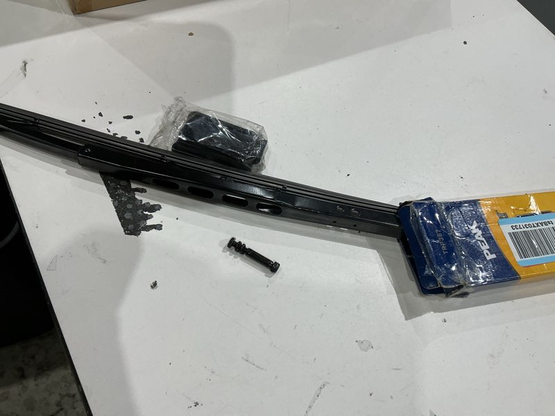 Condition photo showing As Is for peak transport heavy duty windshield wiper blade, durable metal wiper blade replacement for class 6-8 trucks, class a rv's, and transit buses with saddle wiper arm and 36" wide saddle blade