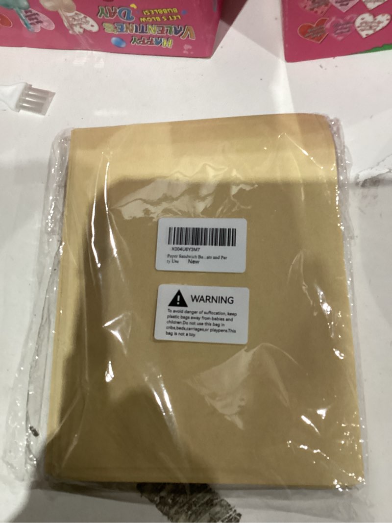 Condition photo showing New/Like New for Paper Sandwich Bags - 50 Pack 7.87 x 5.9 Inches Paper Snack Bags, Pastry Bags for Baked Goods, Greaseproof Donut Bags & Cookie Sleeves for Homemade Cookies, Treats and Party Use