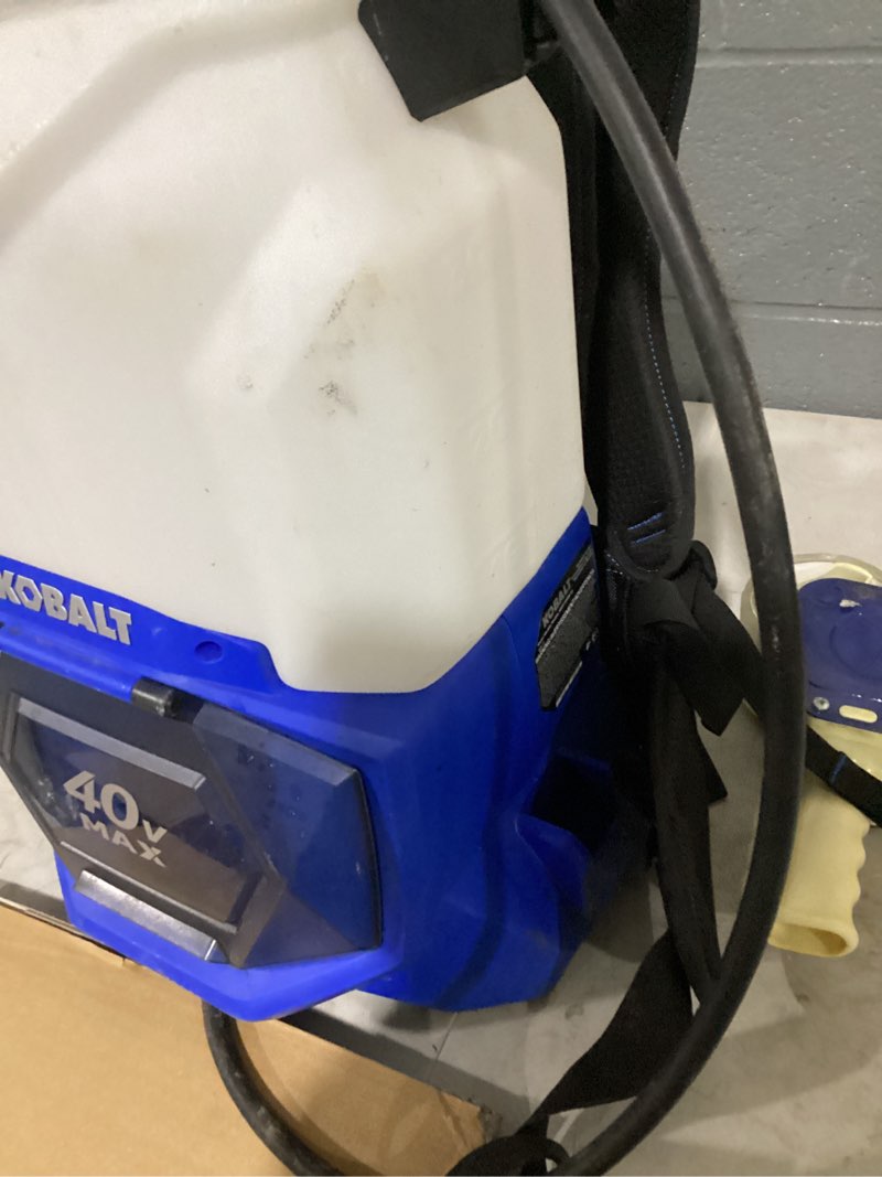 Condition photo showing As Is for kobalt 4-gallon 40-volt battery operated plastic backpack sprayer battery and charger included
