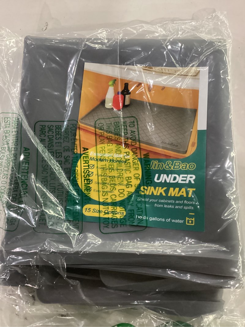 Condition photo showing Good Condition for jin&bao waterproof under sink mat 34" x 22", thick silicone mat cabinet protector for kitchen and bathroom, shelf liner, home organizer and storage, multipurpose tray for gadgets and essentials dark gray 22"w x 34"l