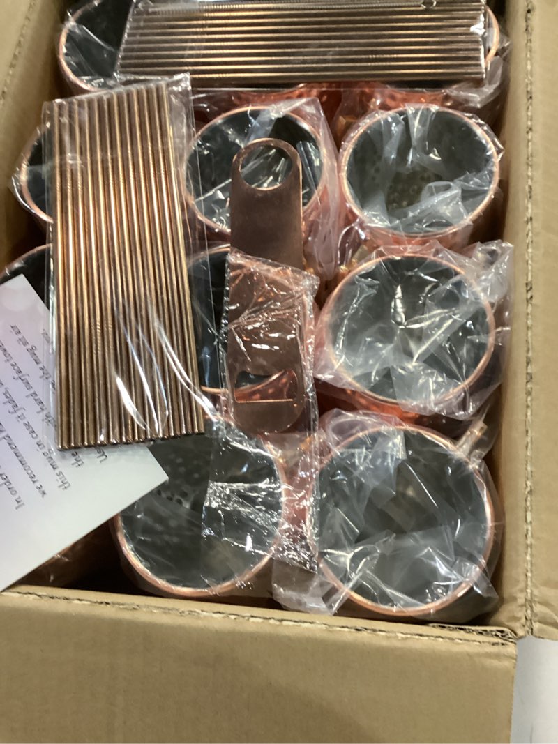 Condition photo showing item condition for Moscow Mule Mugs Set of 24 Packs Copper Mule Mugs 18oz Bulk Large Hammered Stainless Steel Cups with Handle 1pcs 0.5oz Double Jigger 24pcs Stainless Steel Straws for Cold Chilled Drinks Cocktails 24 Piece Set