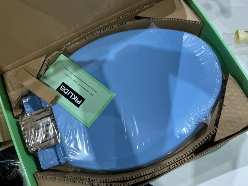 Condition photo showing New/Like New for toilet seat, slow close, soft touch, ultra-smooth matte finish (no orange-peel texture), premium moulded wood, quick release, piklids (royal blue, elongated) royal blue elongated