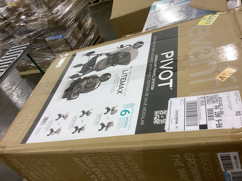 Condition photo showing New/Like New for Evenflo Pivot Modular Travel System with LiteMax Infant Car Seat (Desert Tan) Desert Tan Pivot Modular Travel System with LiteMax Infant Car Seat NEW SIDE IMPACT