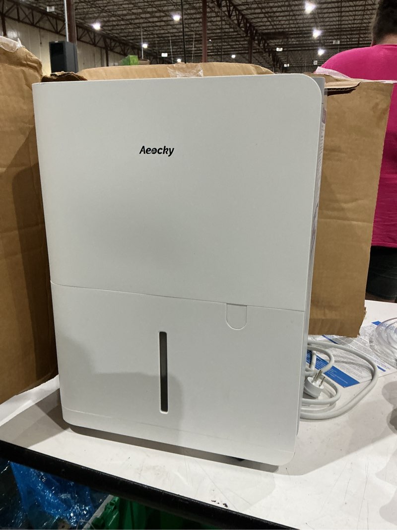 Condition photo showing As Is for aeocky 50 pint/day compressor dehumidifier, 3500sq.ft for basement, home, bedroom, bathroom, with drain hose, 0.8 gallon water tank capacity, intelligent humidistat, quiet