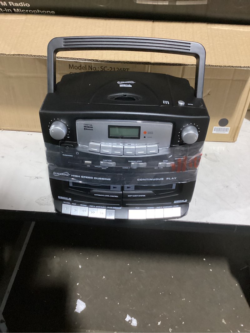 Condition photo showing Good Condition for Supersonic Black Edition Vintage Bluetooth Stereo System Home Music Audio System,CD/MP3 Player,AM/FM Radio,Dual Cassette Player/Rec USB inputs,Detachable Speakers,AC/DC,(Remote Included)Matte Black