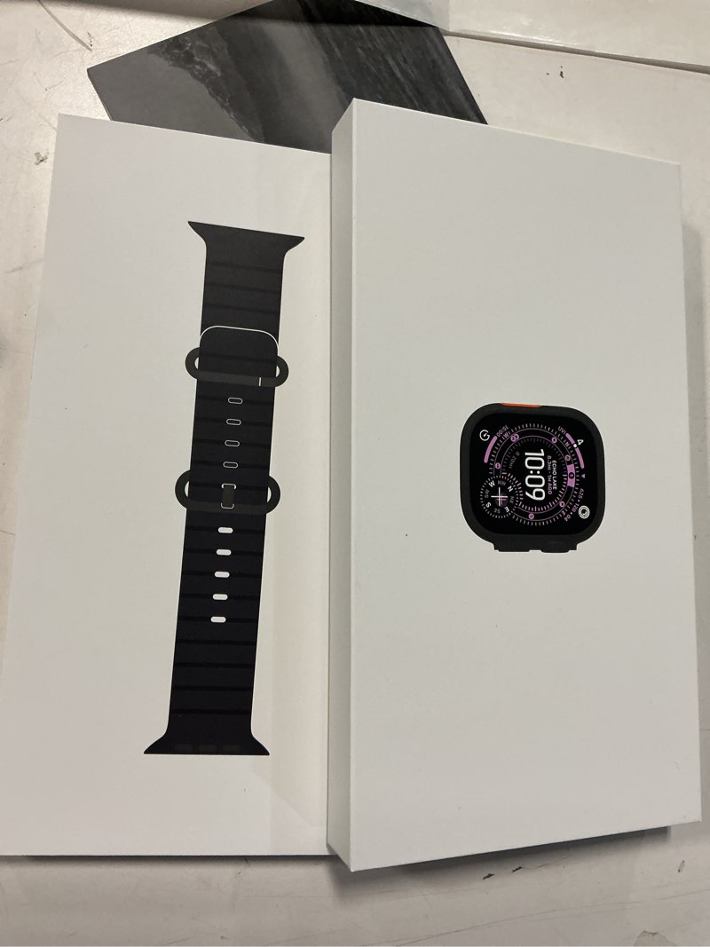 Condition photo showing New/Like New for Apple Watch Ultra 3 [GPS + Cellular 49mm] Running & Multisport Smartwatch w/Rugged Titanium Case w/Black Ocean Band. Satellite Communications, Advanced Health & Fitness Tracking Black Titanium Case with Black Ocean Band One Size Without AppleCare+