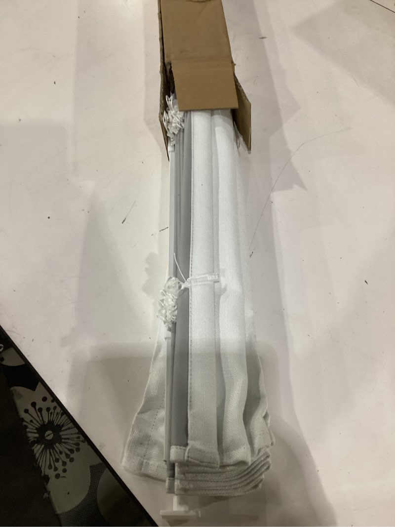 Condition photo showing Good Condition for unishades no drill cordless roman shades for windows, 22" w × 64" h - 100% blackout - linen - mist white 100% blackout linen white 22" w × 64" h