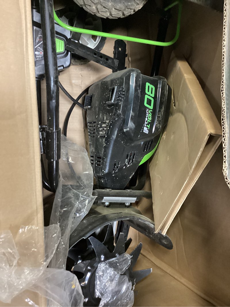 Condition photo showing As Is for greenworks pro 80v 10 inch cultivator with 2ah battery and charger, tl80l210, black and green 80v 10"(2.0ah)