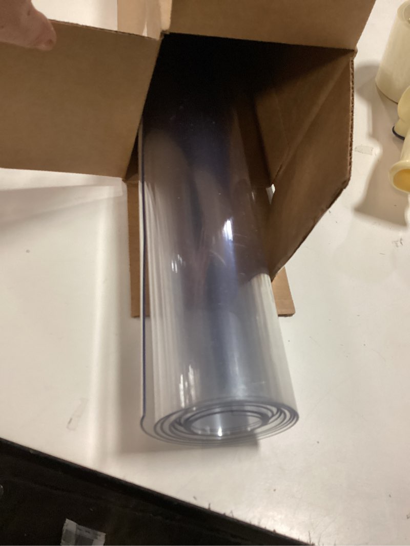 Condition photo showing As Is for Clear Table Cover Protector Rectangle 42 x 70 Inch, 1.5mm Transparent Plastic Table Protector Waterproof, Anti-Scratch Clear Desk Mat for Office Desktop Dresser Dining Table, FDA Compliant Clear 1.5mm 42'' x 70''