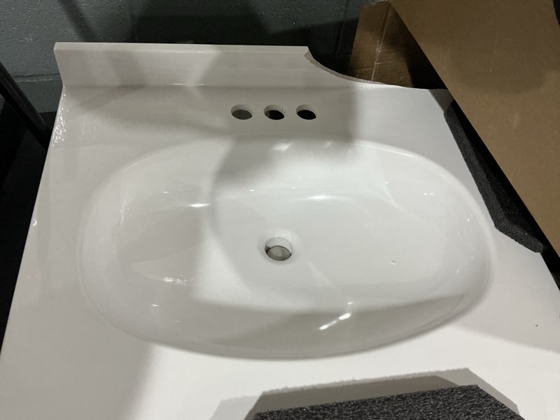 Condition photo showing As Is for project source white cultured marble vanity top with oval basin 25-in x 22-in white cultured marble integral single sink 3-hole bathroom vanity top