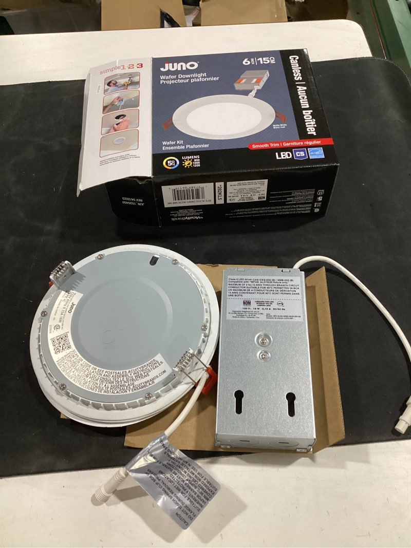 Condition photo showing As Is for juno matte 6-in 1050-lumen switchable round dimmable led canless wet rated recessed downlight