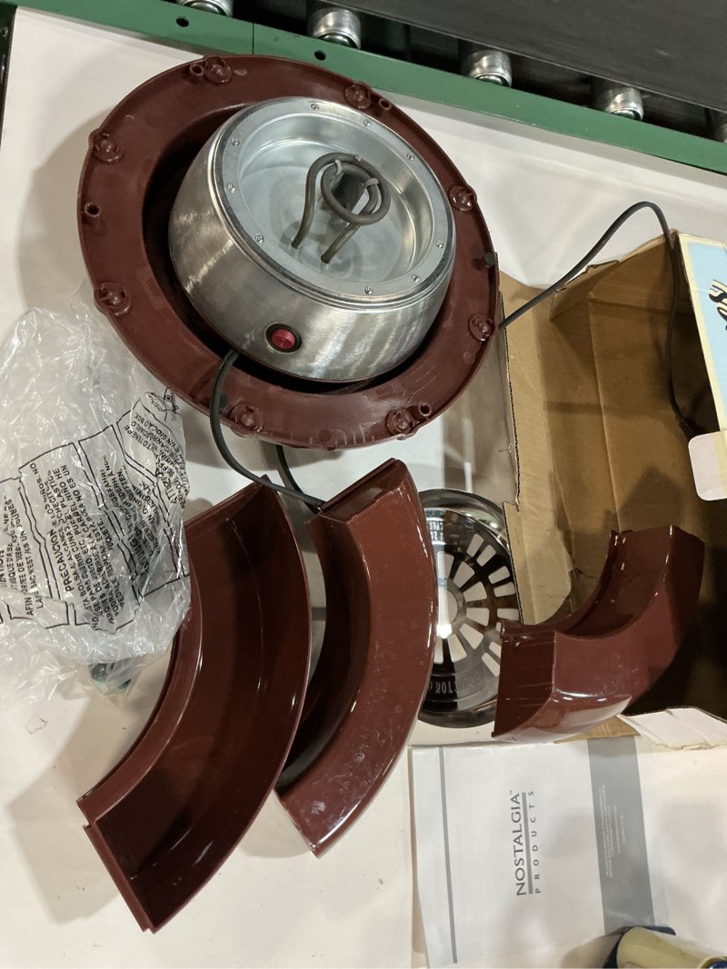 Condition photo showing Good Condition for Nostalgia Indoor Electric Stainless Steel S'Mores Maker with 4 Lazy Susan Compartment Trays for Graham Crackers, Chocolate, Marshmallows and 4 Roasting Forks, Brown Deluxe S'mores Maker