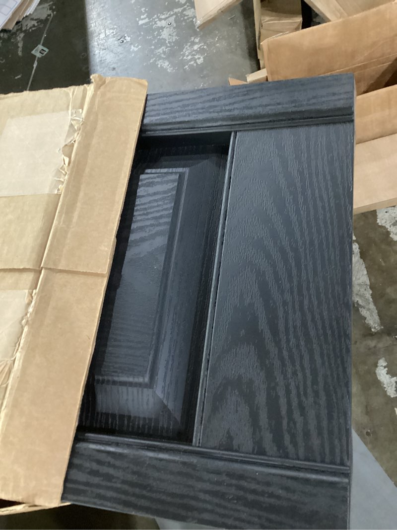 Condition photo showing Good Condition for 14.75 in. w x 43 in. h builders edge  standard two equal panels  raised panel shutters  includes matching installation spikes  002 - black
