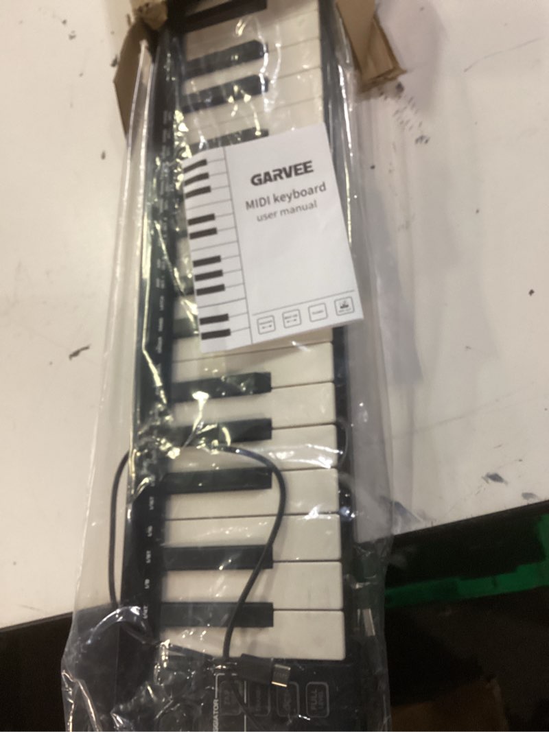 Condition photo showing New/Like New for midi keyboard 37 key, usb midi controller, abs keyboard with daw integration, 8 drum pads, 8 knobs & oled display, perfect for music production md05-37