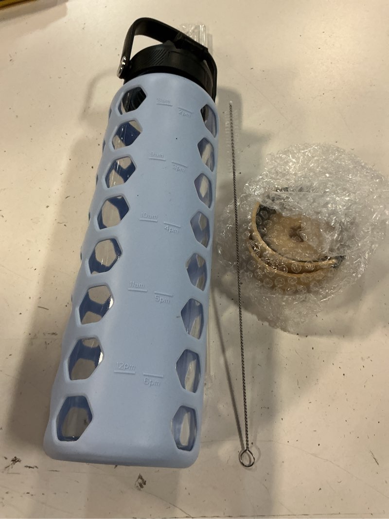 Condition photo showing Good Condition for mukoko glass water bottles,32oz glass tumbler with straw,drinking bottles with 2 lids-handle spout lid&bamboo straw lid,motivational water bottle with time marker and silicone sleeve,1 pack-glacier glacier 32 ounces
