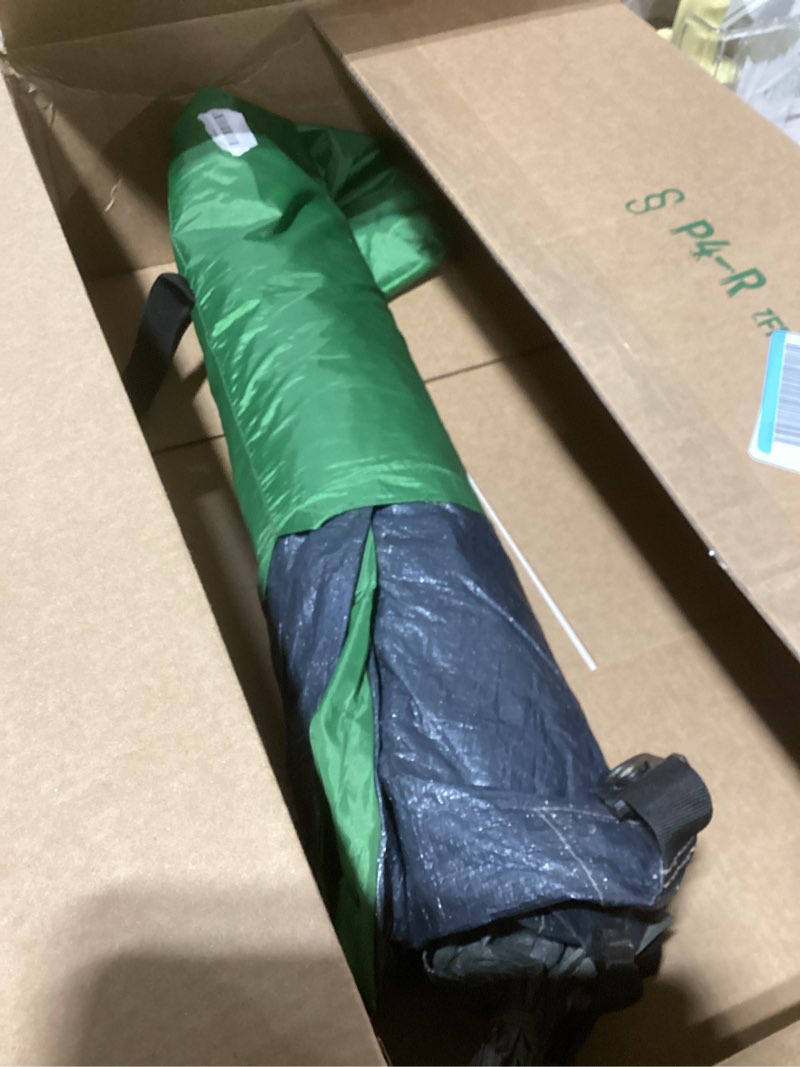 Condition photo showing As Is for Tarp with stake holes. Similar to stock 