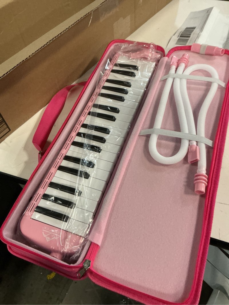 Condition photo showing Good Condition for eastrock 37 key melodica instrument keyboard soprano piano style with mouthpiece tube sets and carrying bag for kids beginners adults gift pink 37key pink