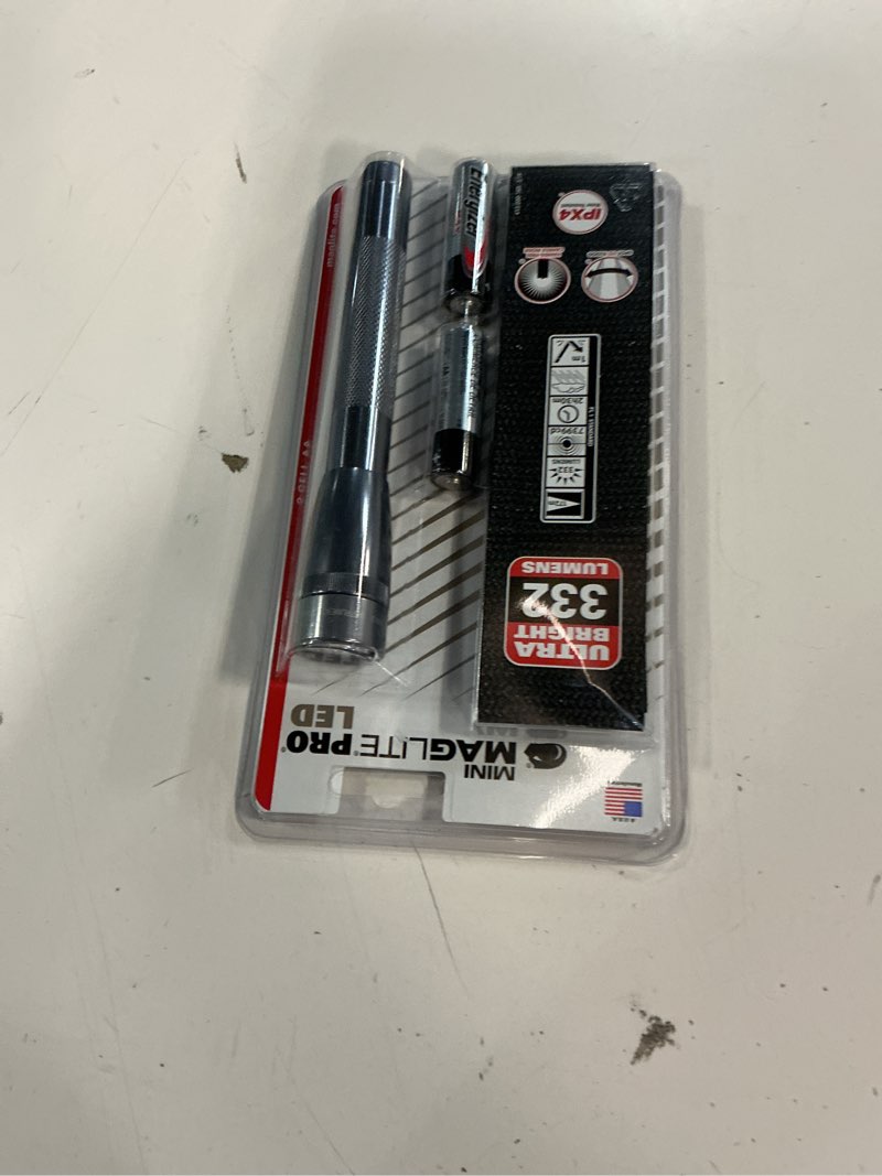 Condition photo showing New/Like New for maglite mini mag pro led flashlight – 2-cell aa compact flashlight with adjustable focus, precise beam, durable construction, long battery life, water-resistant for emergency, outdoor & camping gray