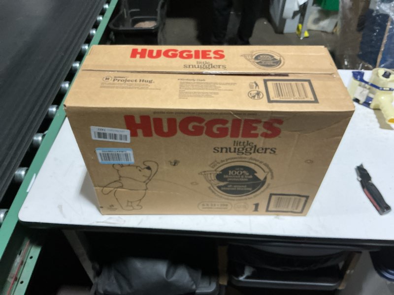Condition photo showing New/Like New for Huggies Size 1 Diapers, Little Snugglers Diapers, Size 1 (8-14 lbs), 198 Count (6 Packs of 33), Packaging May Vary
