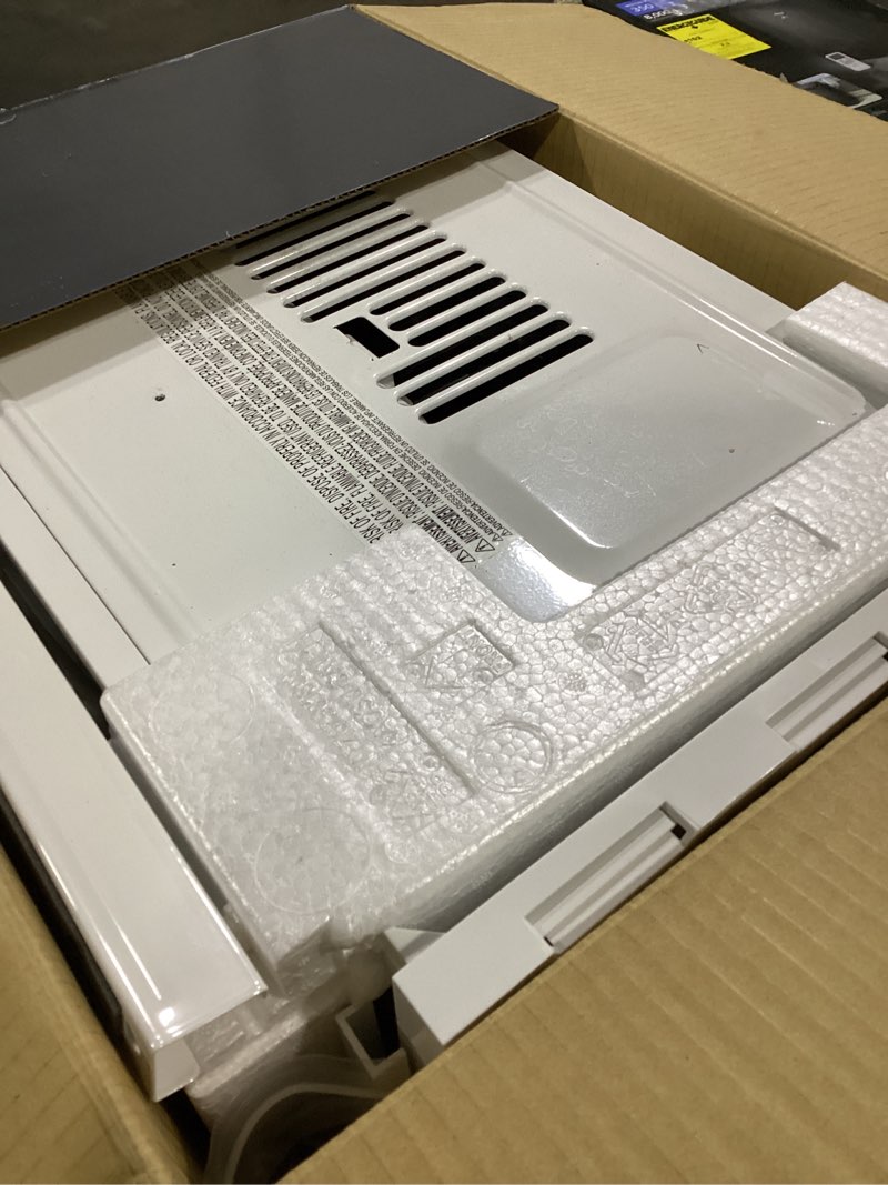 Condition photo showing Good Condition for 5,000 btu 115-volt window air conditioner 150 sq. ft. rooms with remote in white