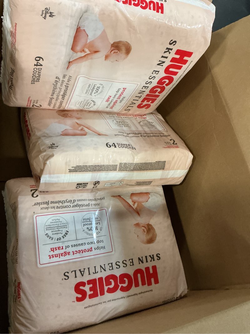 Condition photo showing New/Like New for Huggies Size 2 Diapers, Skin Essentials Baby Diapers, Size 2 (12-18 lbs), 192 Count (3 Packs of 64), Packaging May Vary Size 2 192