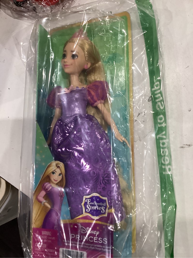 Condition photo showing Good Condition for mattel disney princess style stories rapunzel fashion doll with removable gown, tiara and earrings, inspired by disney's tangled