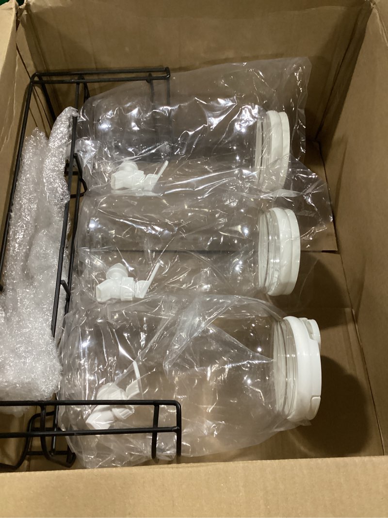 Condition photo showing Good Condition for tanlade 3 pcs plastic drink dispenser with stand beverage dispenser with sturdy metal base juice dispensers for parties lemonade jar spigot for weddings countertop, each 1 gallon(white) as shown in the picture