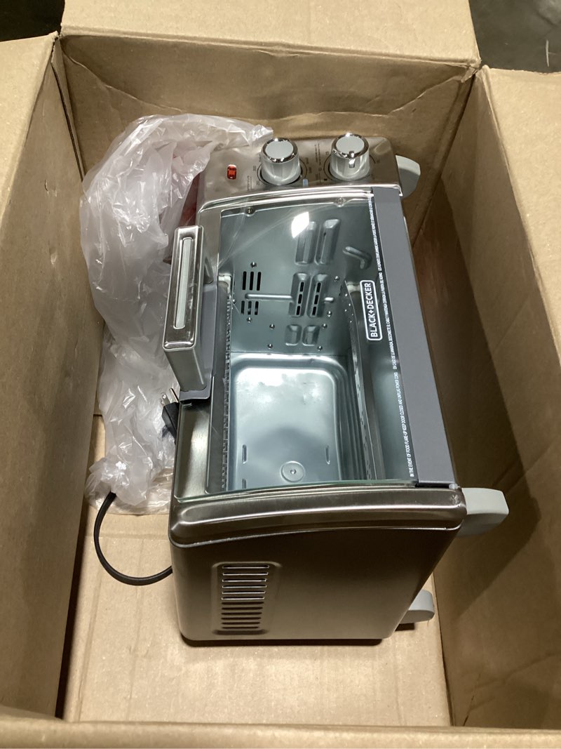 Condition photo showing As Is for BLACK+DECKER Crisp 'N Bake Air Fry Countertop Convection Toaster Oven, Medium Capacity, 4-Slice, 5-in-1, Fits 9” Pizza, 30-Min Timer, Bake, Broil, Air Fry, Toast, Keep Warm, Stainless Steel